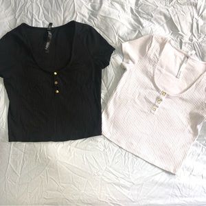Black + white Victoria secret medium crop tops. Sold together.